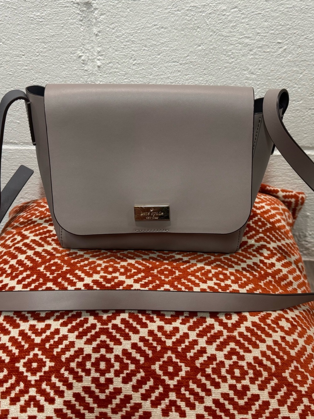 kate spade taupe leather flap crossbody with gold plaque